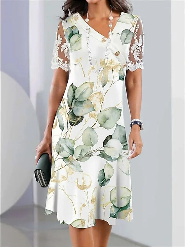 Asymetryczna sukienka z falbankami i kwiatowym wzorem