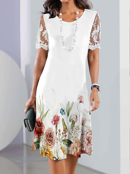 Asymetryczna sukienka z falbankami i kwiatowym wzorem